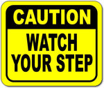 Caution watch your step Bright yellow metal outdoor sign