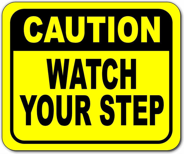 Caution watch your step Bright yellow metal outdoor sign