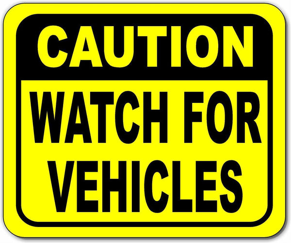 Caution watch for vehicles Bright yellow metal outdoor sign