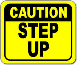 Caution step up watch your step Bright yellow metal outdoor sign