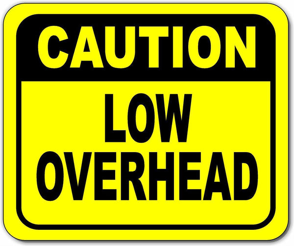 Caution watch your head low overhead Bright yellow metal outdoor sign